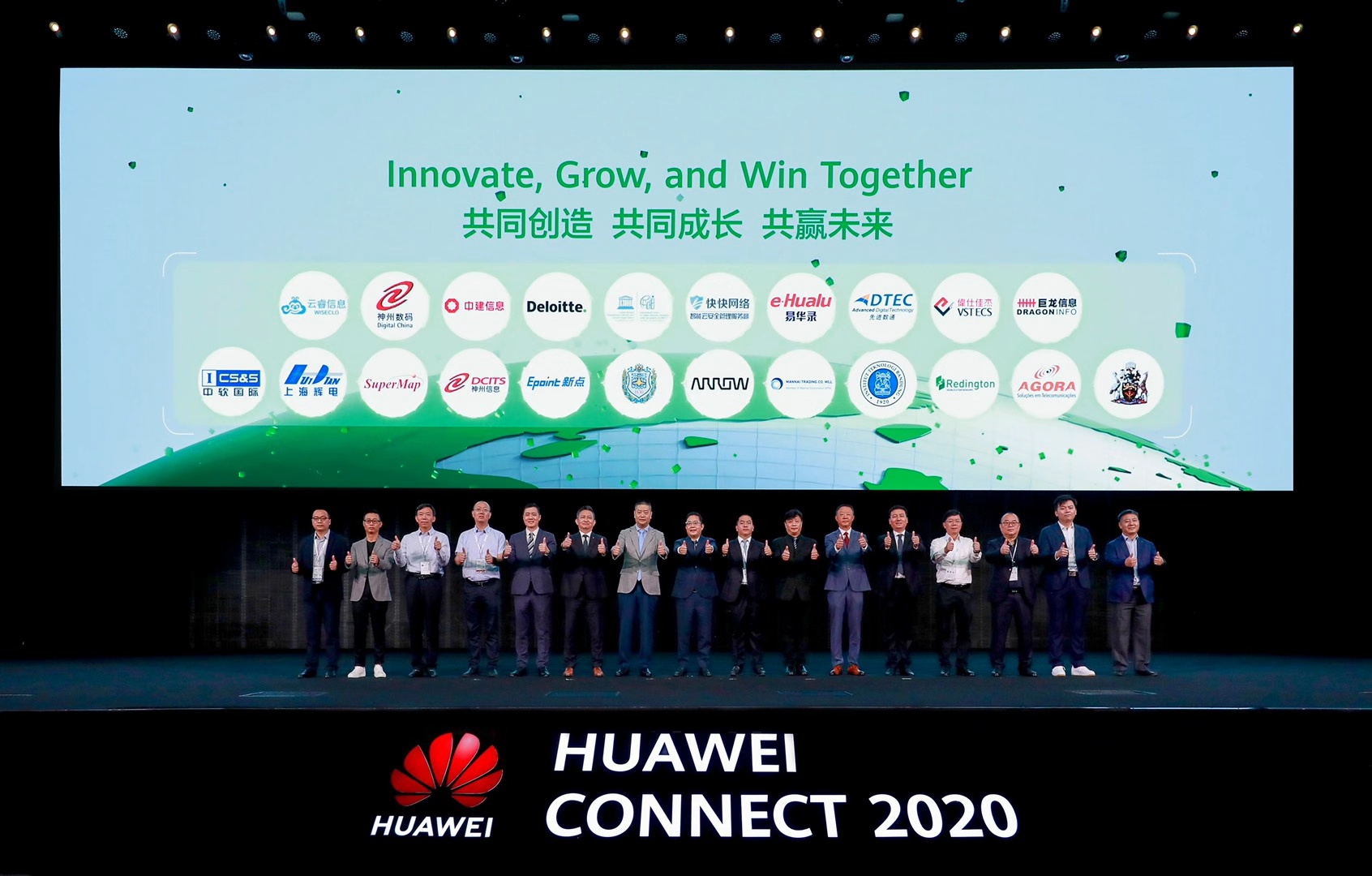 A group of top Huawei executives on stage giving the thumbs up at HUAWEI CONNECT 2020